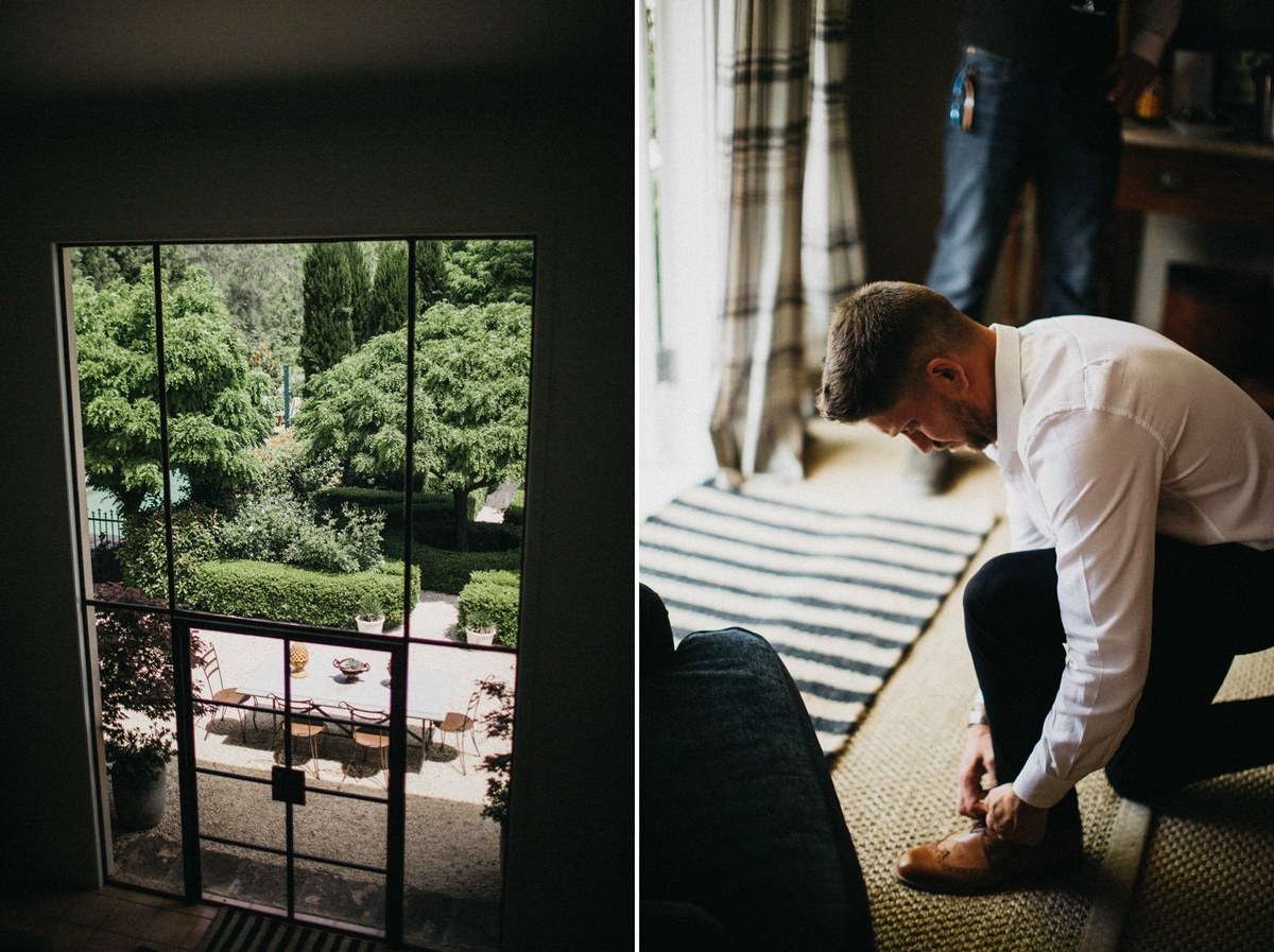 Groom getting ready at Redleaf Wollombi — Joshua Mikhaiel, documentary wedding photographer The groom bends down to adjust his shoes beside a window. Photograph by documentary wedding photographer Joshua Mikhaiel.