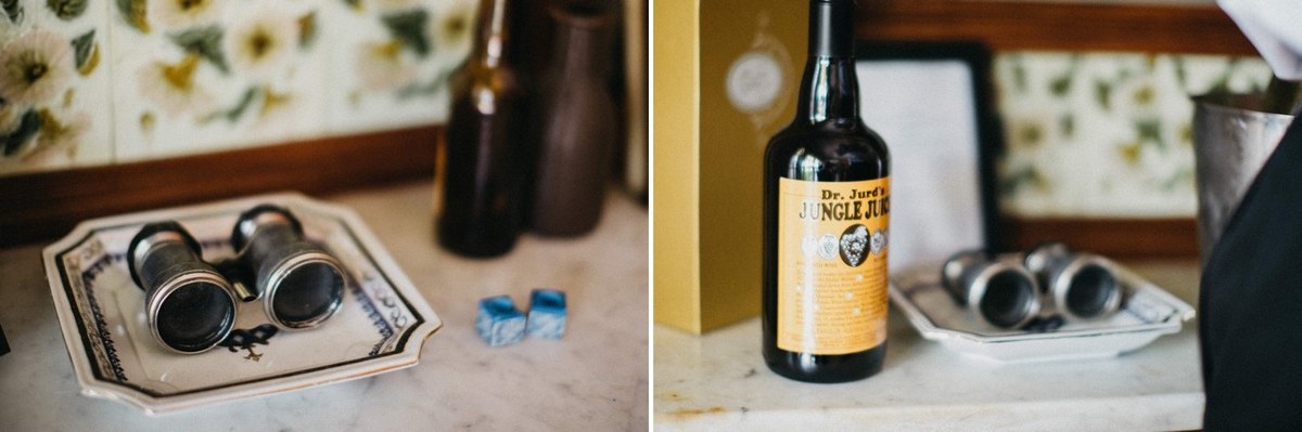 Wedding morning details at Redleaf Wollombi — Joshua Mikhaiel, documentary wedding photographer A grooming kit and bottle of whiskey are arranged on a table. Photograph by documentary wedding photographer Joshua Mikhaiel.