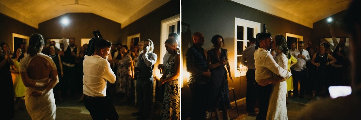 Guest dancing at Redleaf Wollombi — Joshua Mikhaiel, documentary wedding photographer A guest dances with one arm raised in the reception room. Photograph by documentary wedding photographer Joshua Mikhaiel.