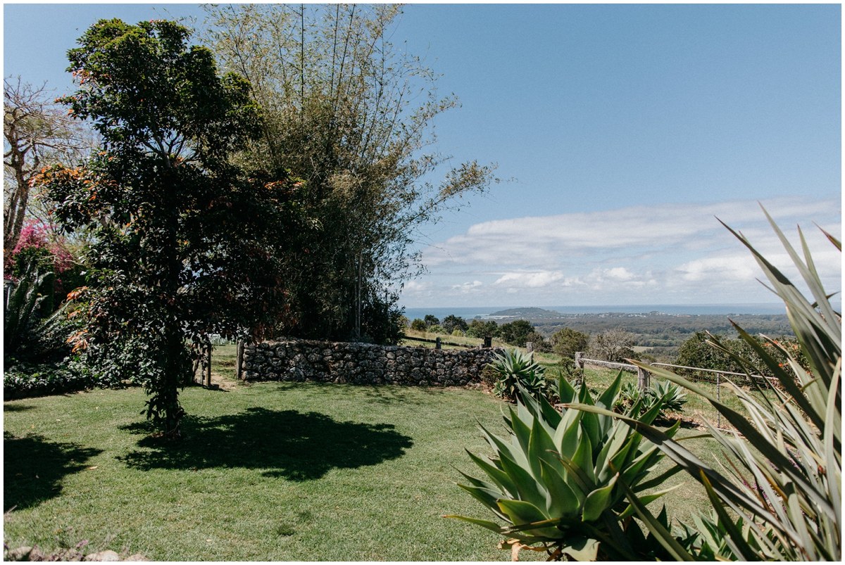 Byron View Farm grounds — Joshua Mikhaiel, documentary wedding photographer A landscaped lawn and mature trees overlook the valley at Byron View Farm. Photograph by documentary wedding photographer Joshua Mikhaiel.